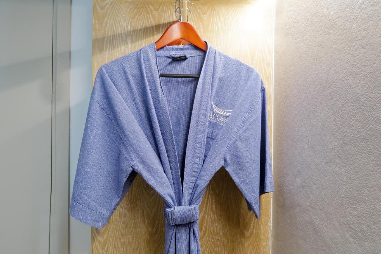 Craft Resort & Villas, Phuket Town Exterior photo A bathrobe